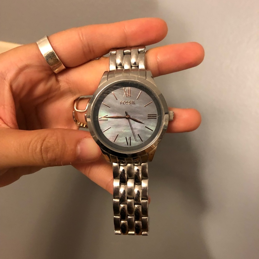 gently used silver fossil watch